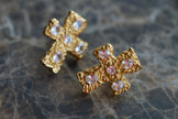 Gold textured cross earrings with round rhinestone accents