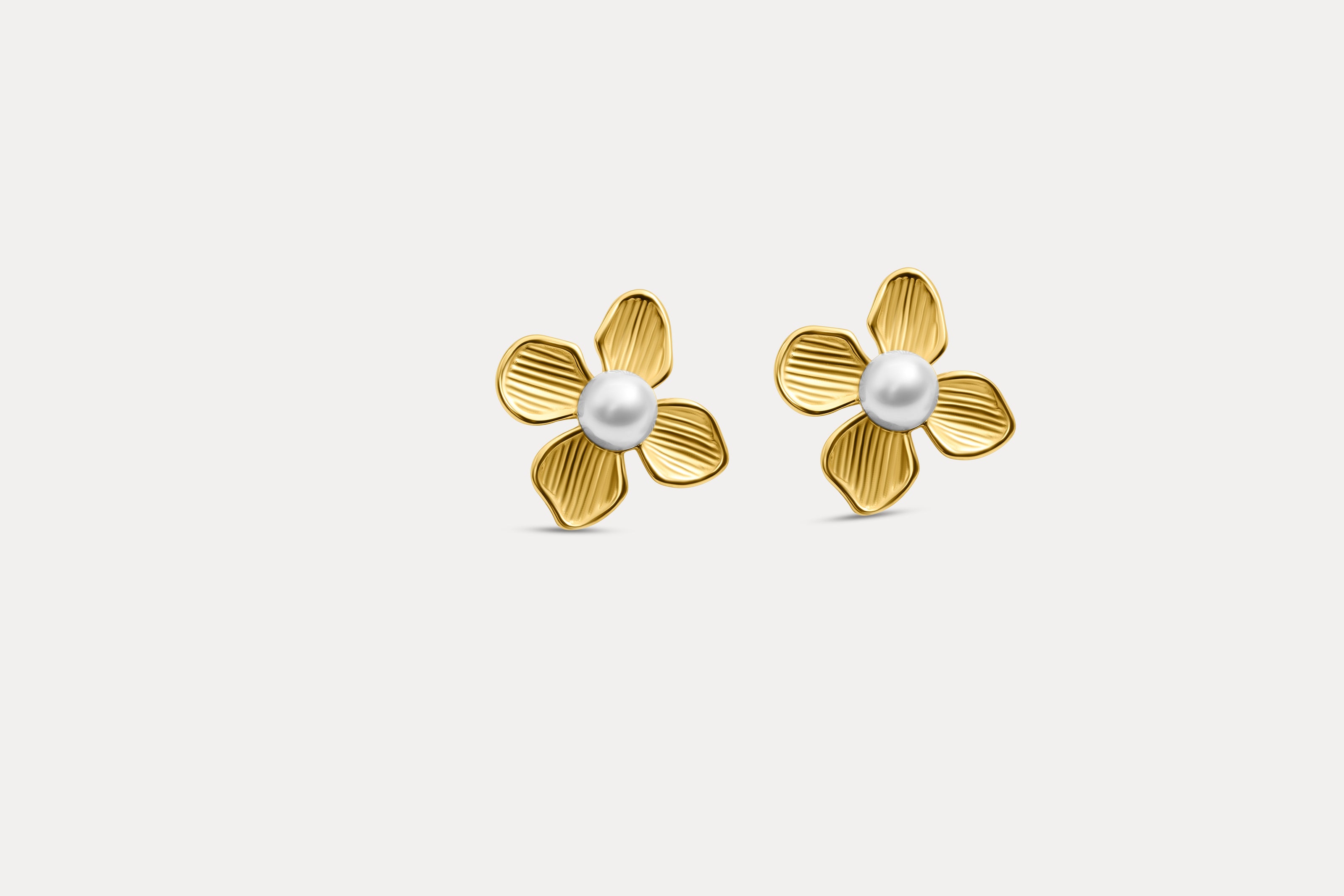 Gold flower pearl stud earrings, three-petal design with white center pearl
