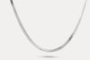 Snake chain necklace in silver-tone metal links, shown laid out
