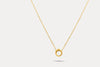 Gold pearl frame necklace with circular pendant on a fine chain