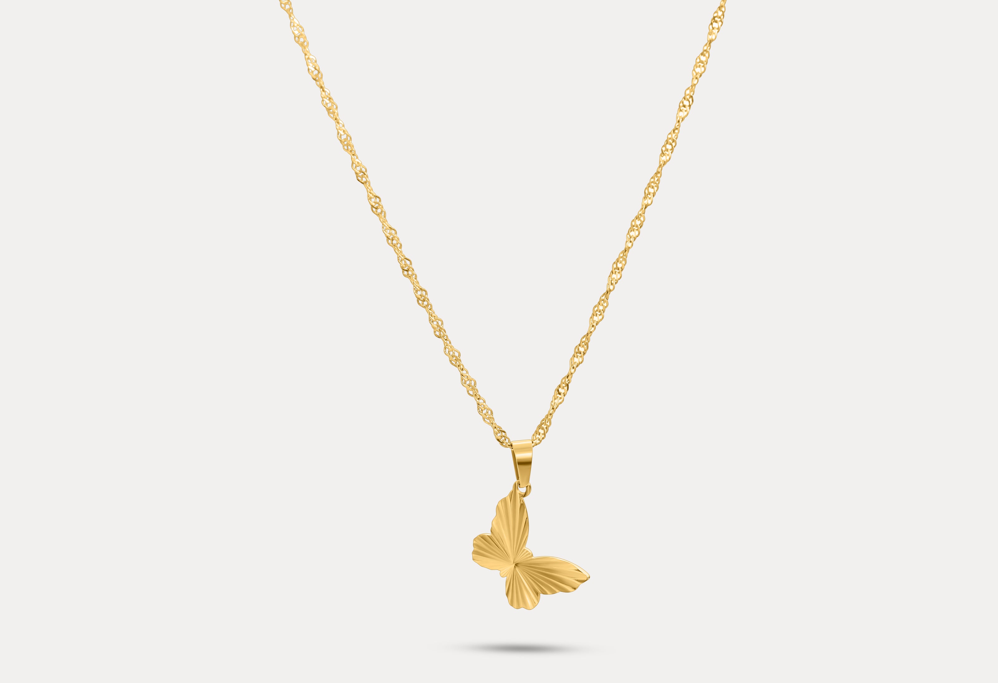 Gold butterfly pendant necklace with delicate chain