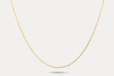 Gold thin chain necklace with small bead-like segments