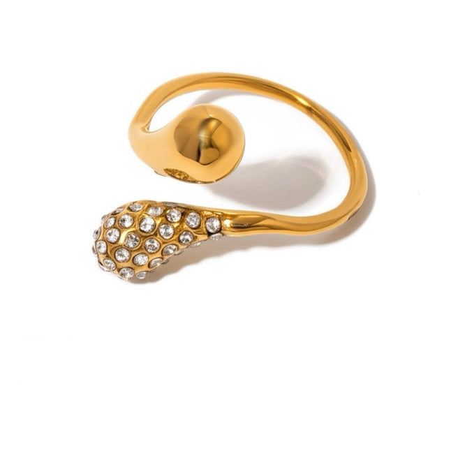 Gold dual-crystal ring with oval bezel and teardrop crystal cluster